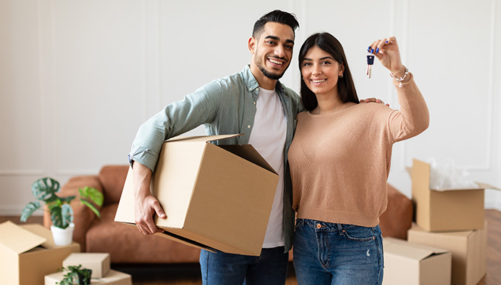 Couple holding keys