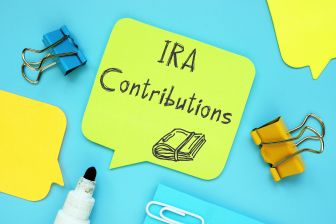 IRA Contributions written on a post it note